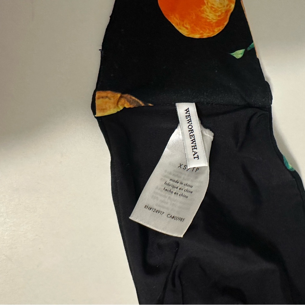 WeWoreWhat Black Bikini Top with Orange Print - Picture 2 of 2